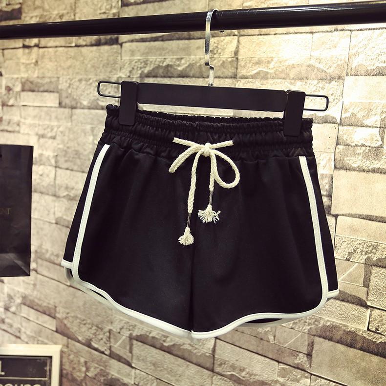 Quần sọt thể thao lưng thun co giãn phối sọc dành cho nữ