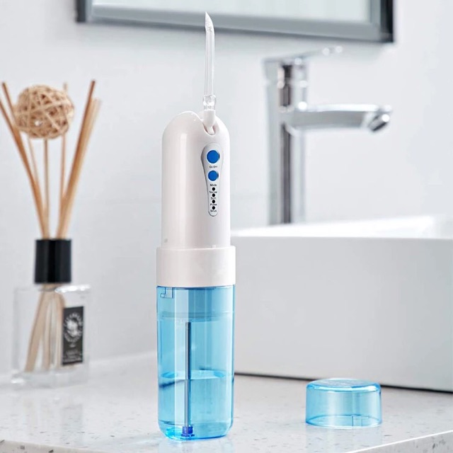 MÁY TĂM NƯỚC WATER FLOSSER IPX7, CAM KẾT CHÍNH HÃNG