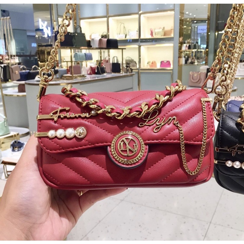 Túi lyn lady khoá tròn huy hiệu