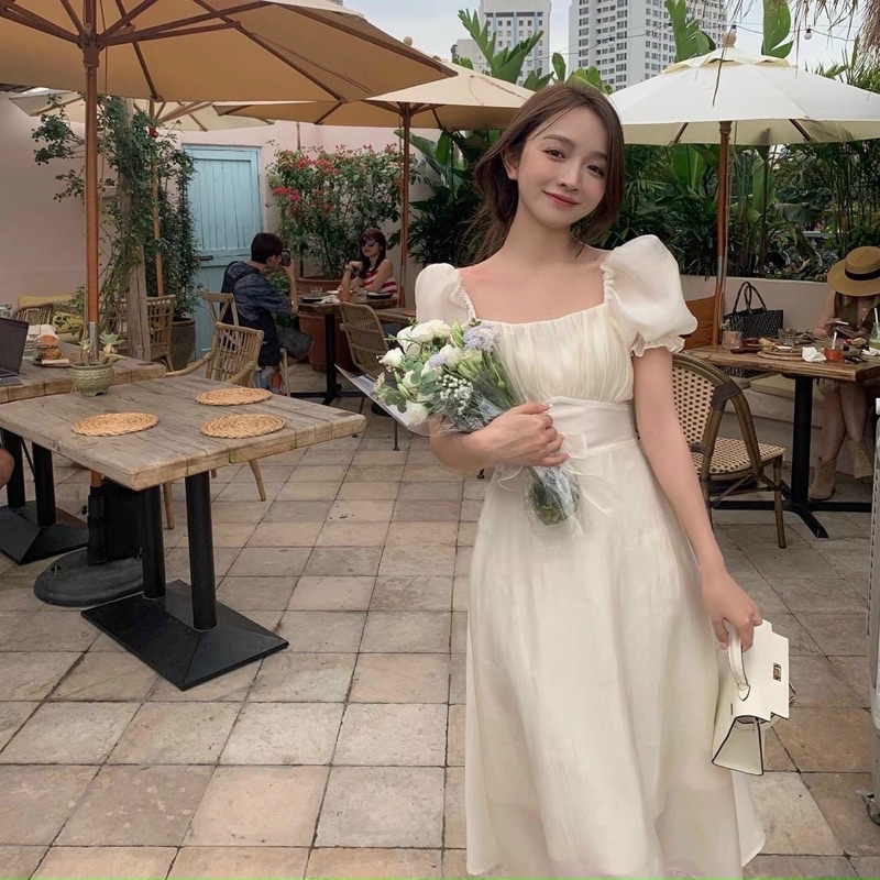 Đầm Midi Kem Xếp Ly Nhún Ngực Tay Bồng Thắt Nơ Lưng