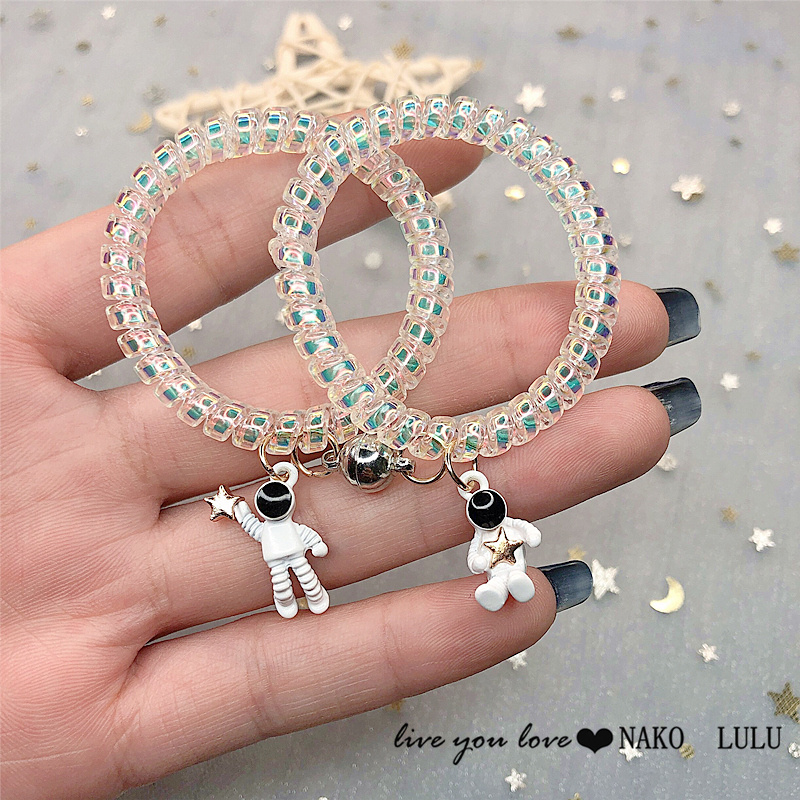 Dây thun cột tóc nam châm hình phi hành gia cho cặp đôi