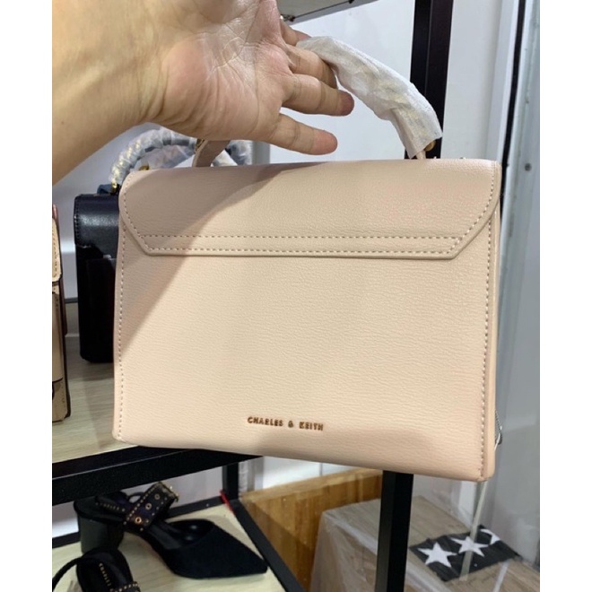 Túi cnk nơ hồng Nude