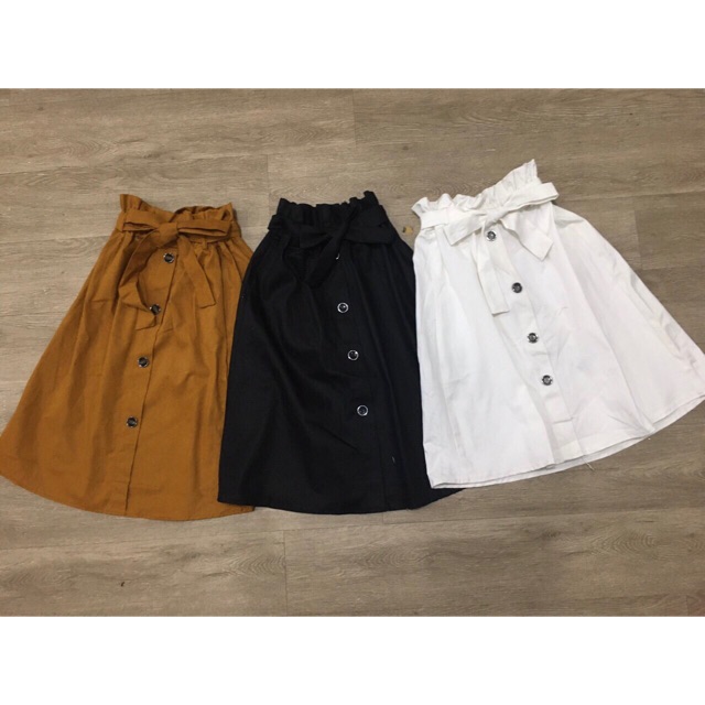 Chân váy kaki phối nút cột nơ fom dài | BigBuy360 - bigbuy360.vn