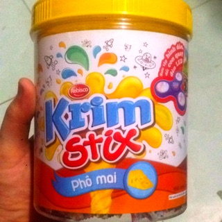 KẸO QUE Krim stix TẶNG CON QUAY ĐÈN LED vị phô mai, socola và sữa