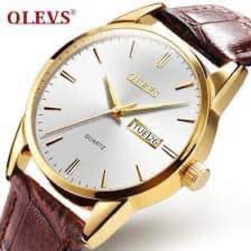 Đồng Hồ đeo tay nam thương hiệu OLEVS khi mua được tặng 1 nhẫn 1 vòng tỳ hưu