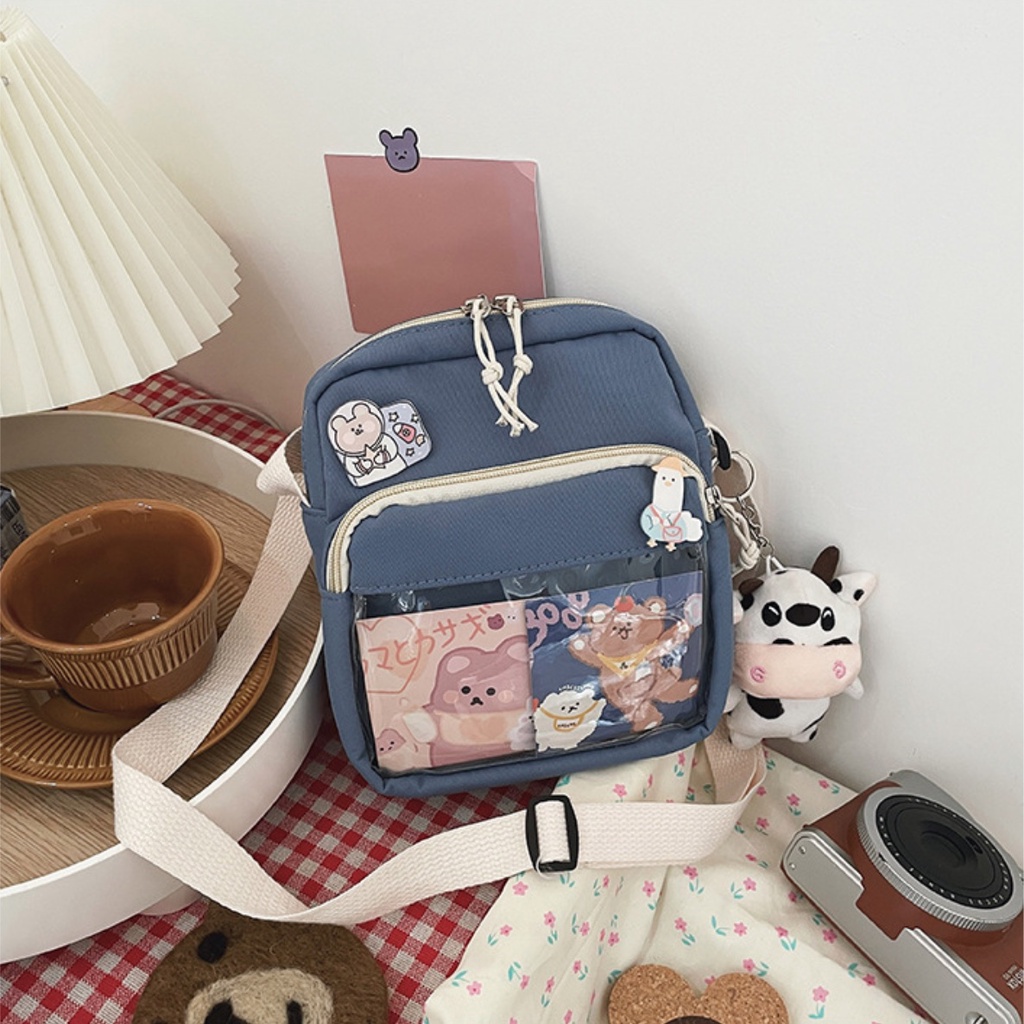 Túi đeo chéo bò sữa