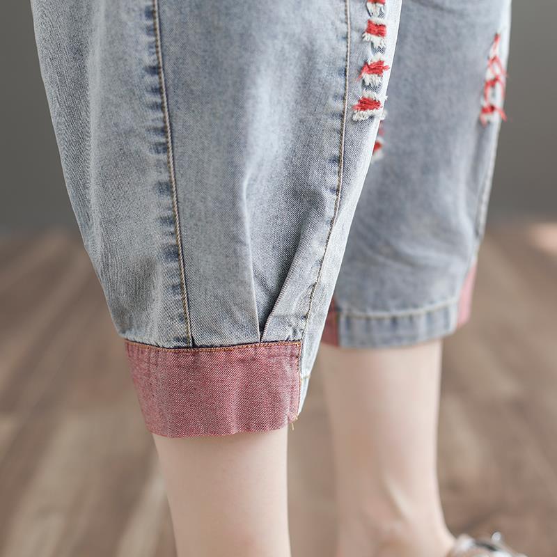 Quần Jeans Lửng Lưng Thun Ống Rộng Phối Vết Rách Cá Tính Cho Nữ