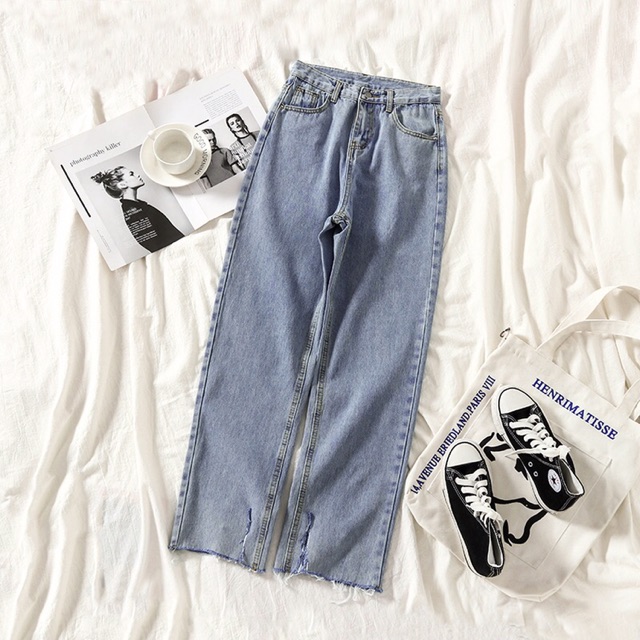 Quần jeans xẻ gấu