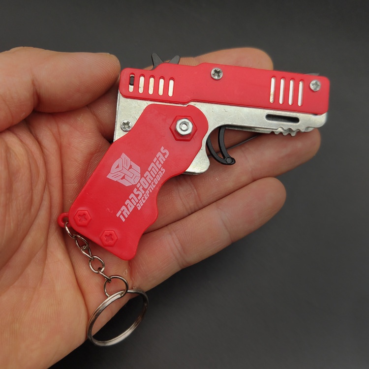 Súng Bắn Dây Thun Móc Chìa Khoá Dạng Đồ Chơi Gấp Gọn Tặng Kèm Dây Thun