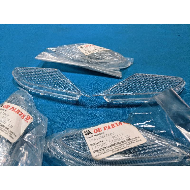 Chụp đèn xinhan trước Suzuki FX 125 chính hãng