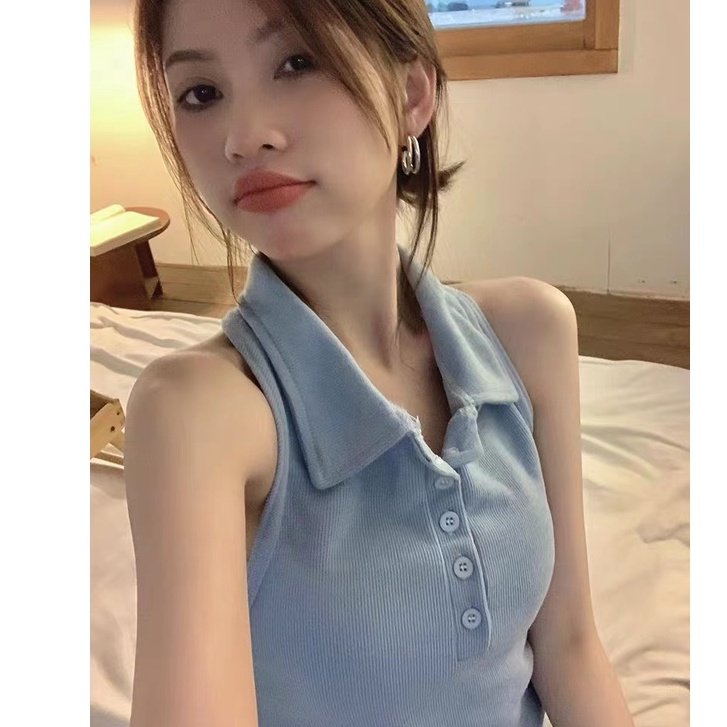 Young fashionable lady sleeveless vest top