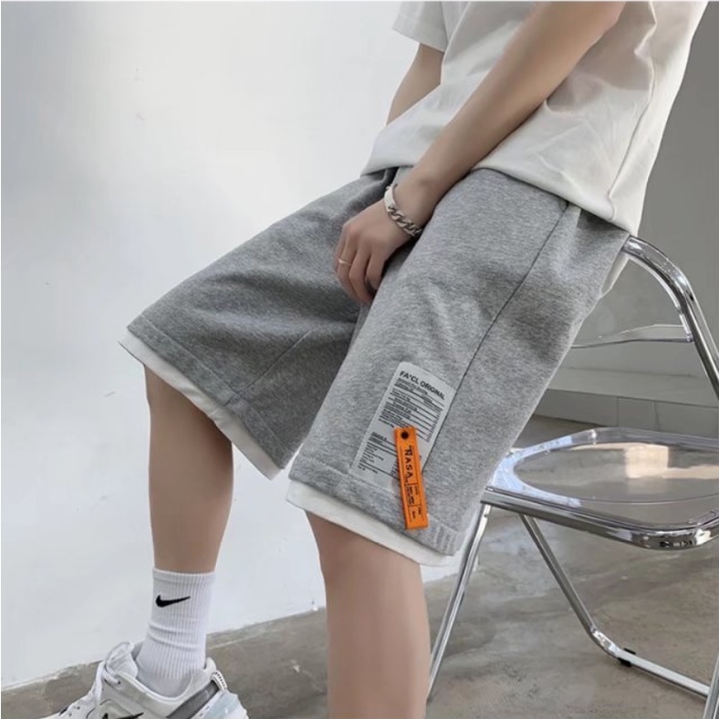 Quần short thể thao ống rộng màu trơn thêu họa tiết thời trang cho nam quần đùi nam from rộng simple màu sắc rắn bông fashion quần short nam in hình unisex