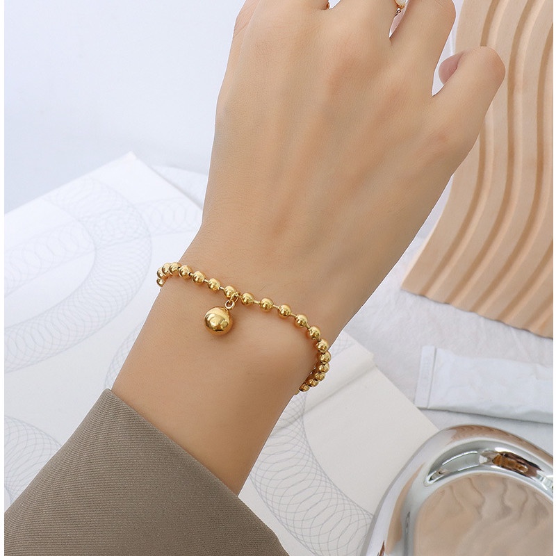 Lắc Tay Bi Trái Châu Titan Ko Đen TT 3557