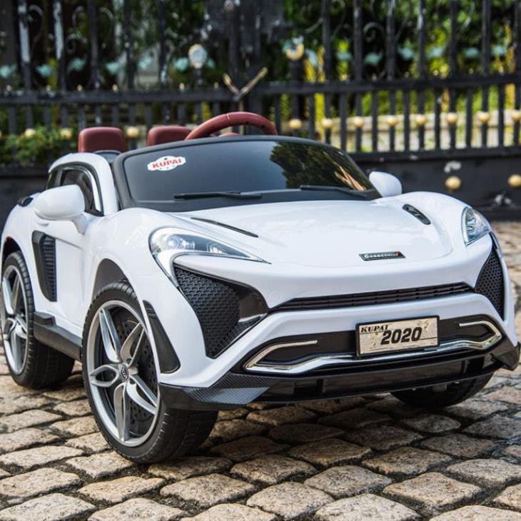 Ô tô xe điện đồ chơi cho bé KUPAI-2020 tự lái và điều khiển 4 động cơ 12V7AH (Đỏ-Cam-Trắng)