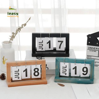 1 lịch chụp ảnh để bàn được làm từ gỗ tự trang trí trong văn phòng
