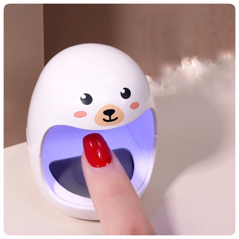 Đèn hơ , máy hơ móng mini.