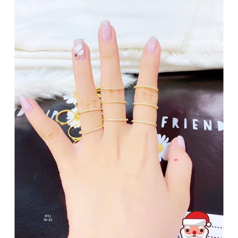 Nhẫn 1 hàng đá 1,5ly vàng 10kara