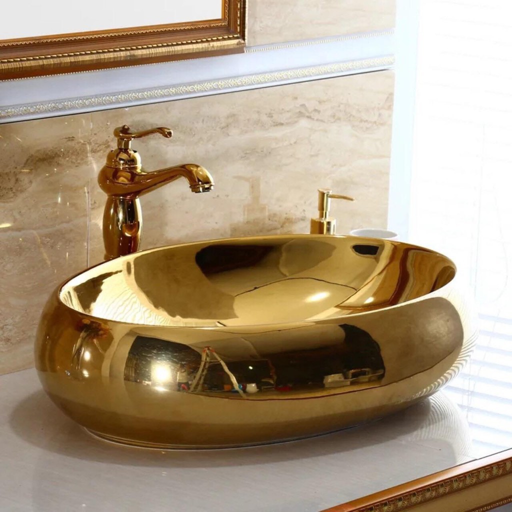 Chậu rửa lavabo elip mạ vàng cực đẹp với  độ bền cao thời gian sử dụng trên 20 năm .