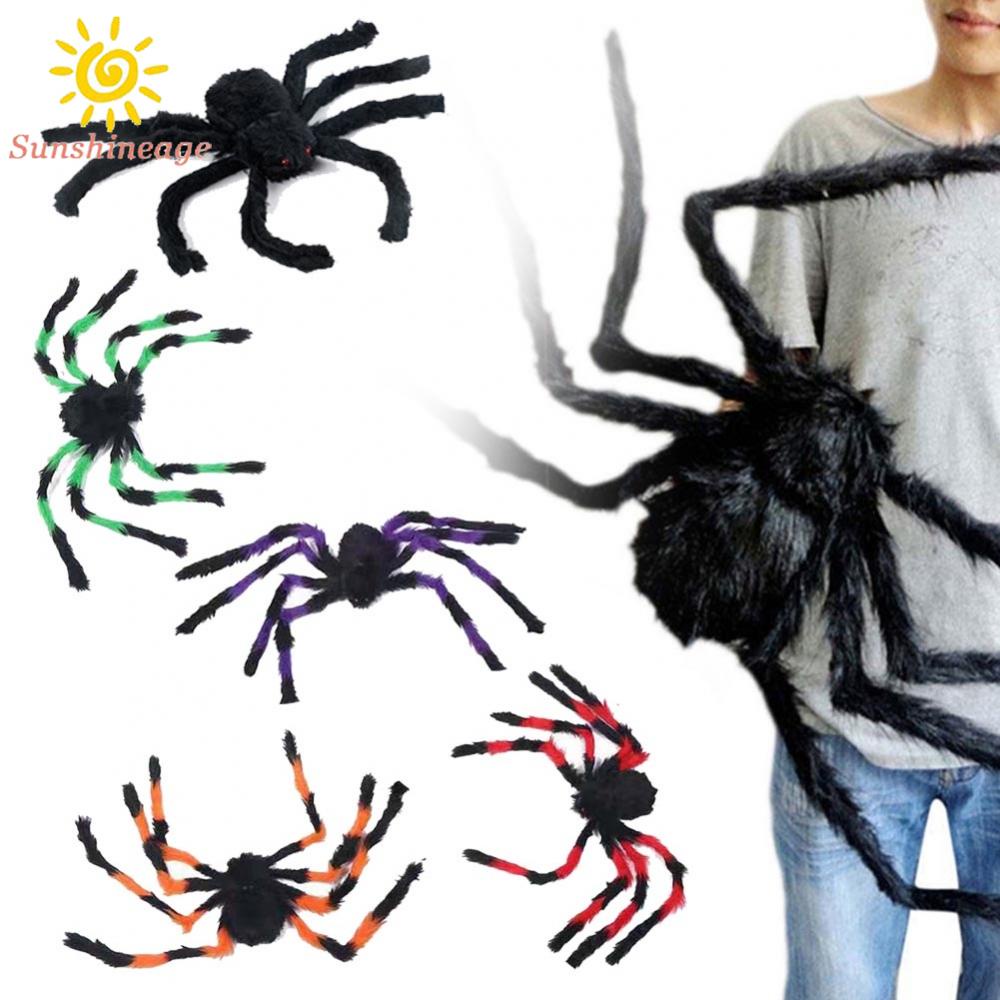 Halloween giant spiders hang in haunted homes, decorated with black fake spiders, cunning toys and Halloween gifts