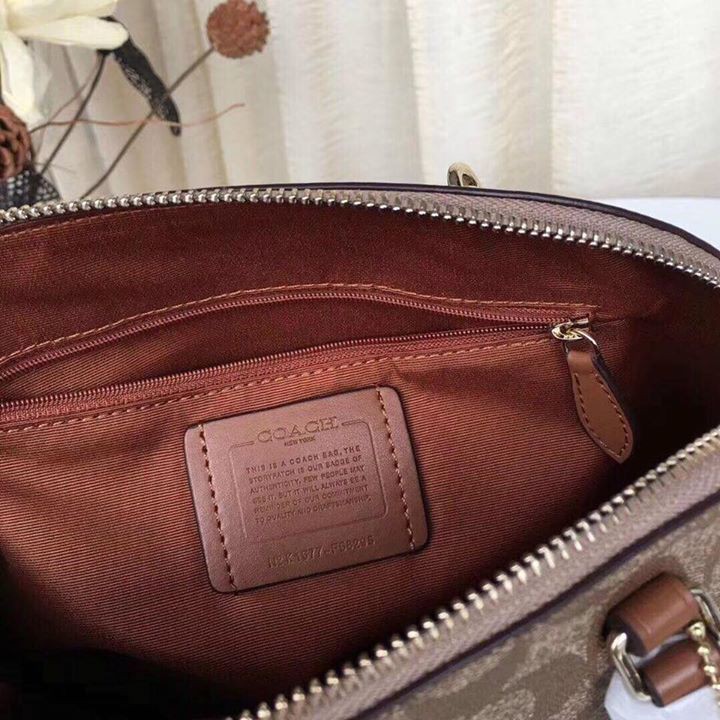 Túi xách Coach hến nâu
