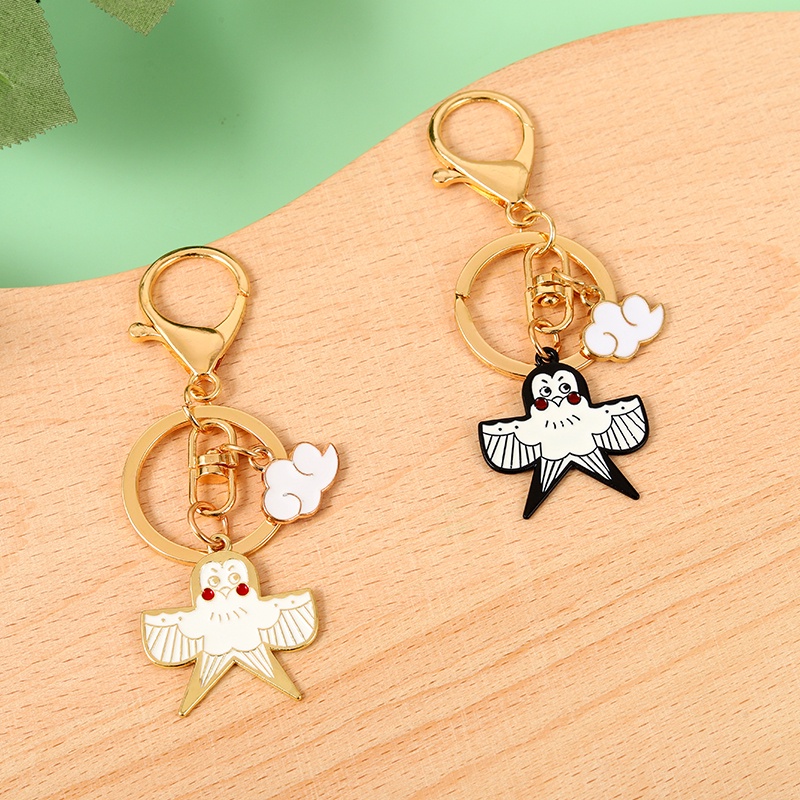 Móc khóa QIHE JEWELRY hình chim én màu vàng/ đen làm quà tặng cho bạn bè