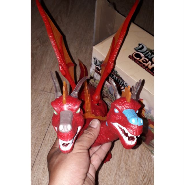 Khủng long chạy PIN 2 đầu có cánh và đẻ trứng có nhạc đèn Led tặng kèm PIN