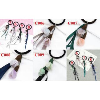 Cột tóc hoa rơi