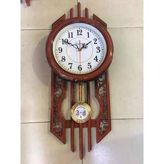 Đồng hồ treo tường nhựa giả gỗ