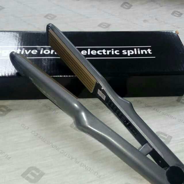 Máy dập xù tóc HQ878