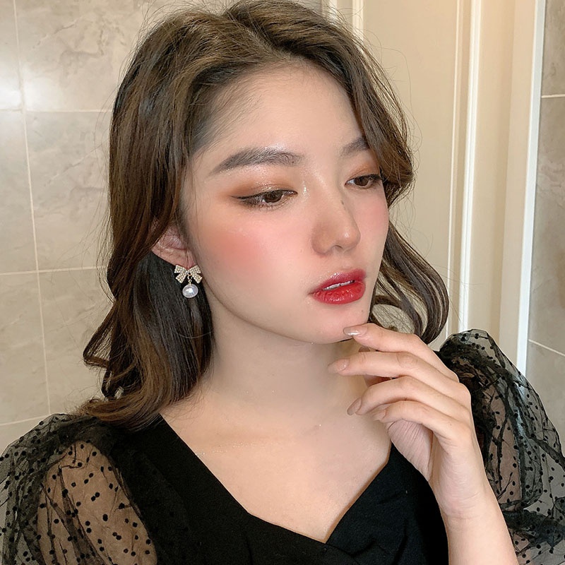 Khuyên tai hình nơ đính ngọc trai kiểu dáng thanh lịch cho nữ