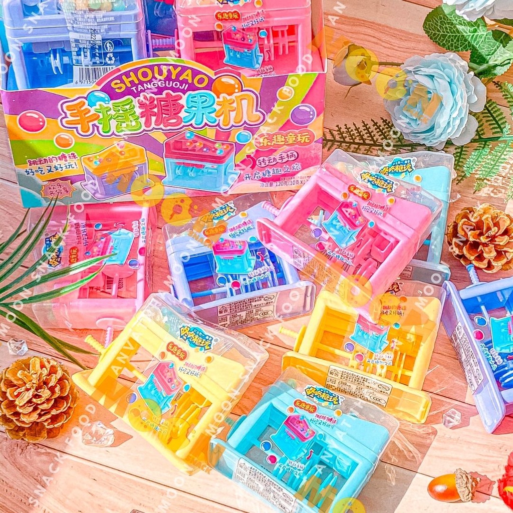 Máy bắn kẹo có trục quay siêu cute vừa ăn vừa chơi
