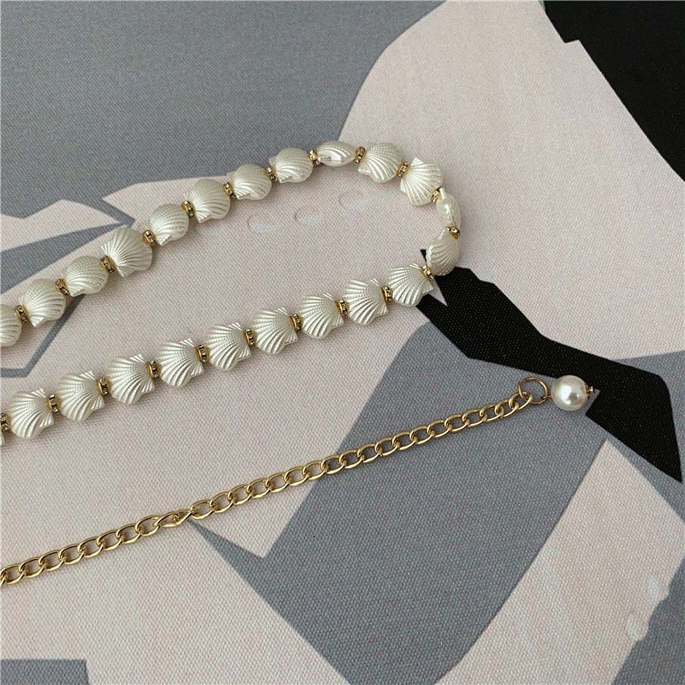 Dây thắt lưng mỏng đính hạt ngọc trai phối tua rua thời trang Hàn Quốc dành cho nữ