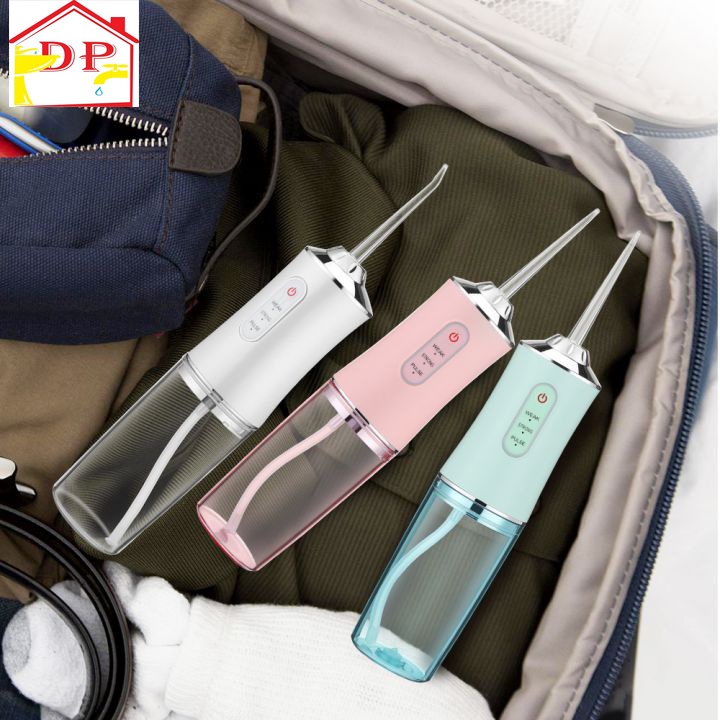 Máy tăm nước vệ sinh răng miệng siêu sạch cầm tay chính hãng theo công nghệ Châu Âu Oral Irrigator tặng kèm 4 đầu phun