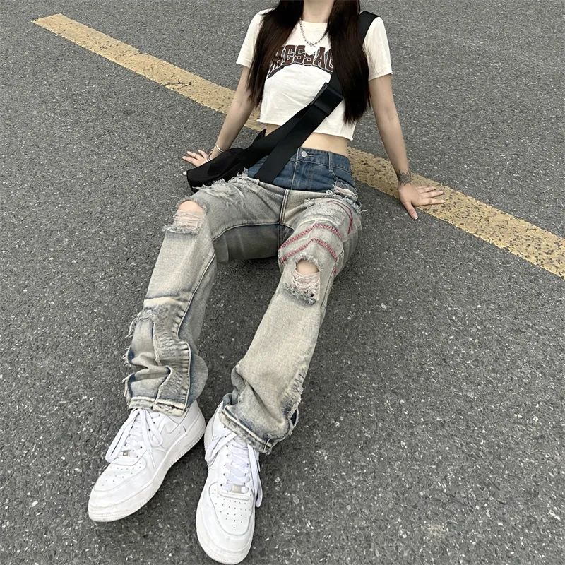 European and American high street patchwork torn jeans new fashion brand design sense small crowd pants fried Street pants for men and women