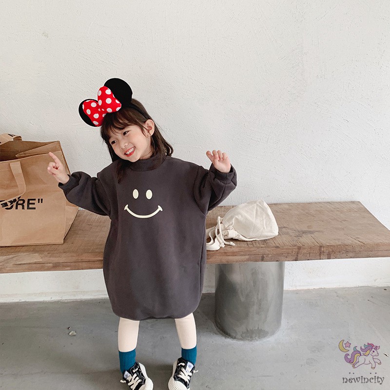 Đầm Thun Dài Tay In Họa Tiết Mặt Cười Cho Bé