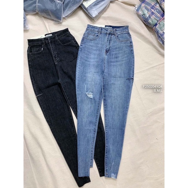 Quần jeans rách lai