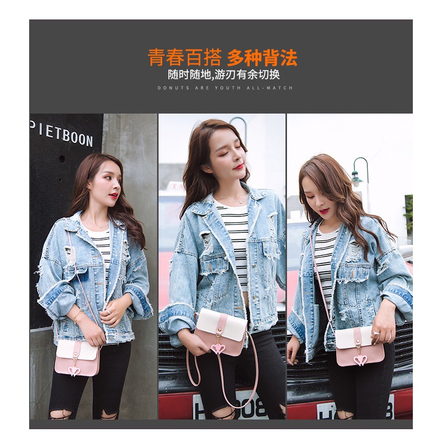 Túi đeo chéo da mềm đính núm tua nữ tính