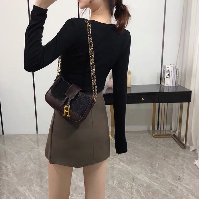 Chân váy ngắn chữ A lưng cao có quần trong phối nút xẻ tà cá tính màu đen - Chân váy kaki nữ | BigBuy360 - bigbuy360.vn