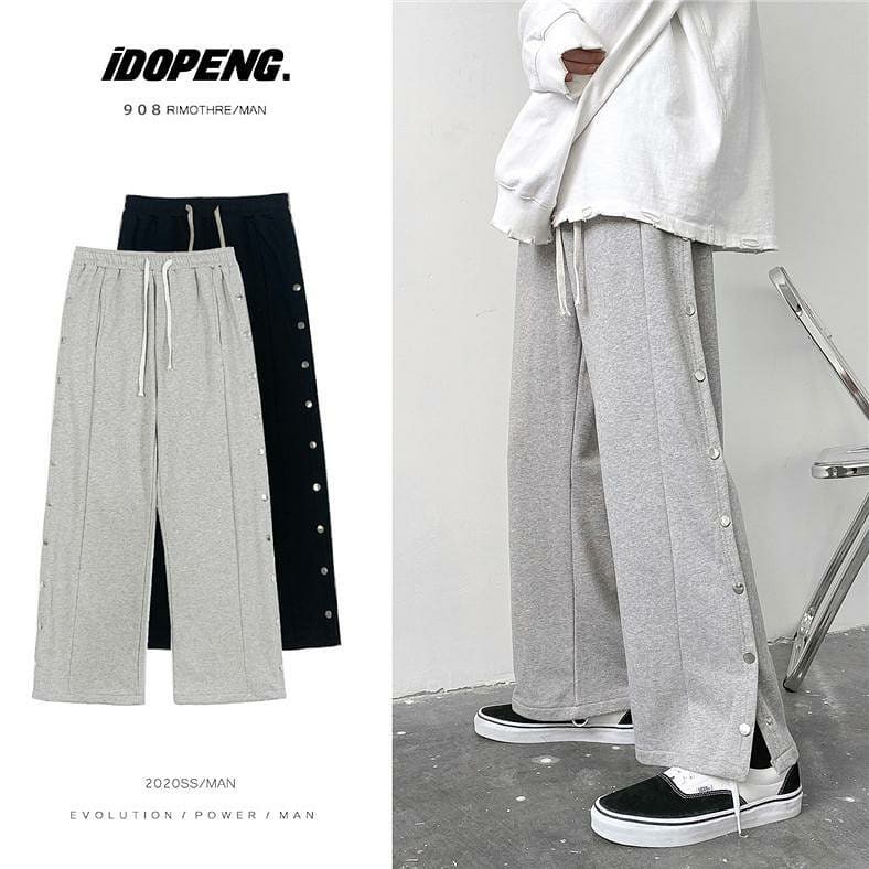 Quần unisex ống rộng dập cúc hai bên 2 màu đen - xám