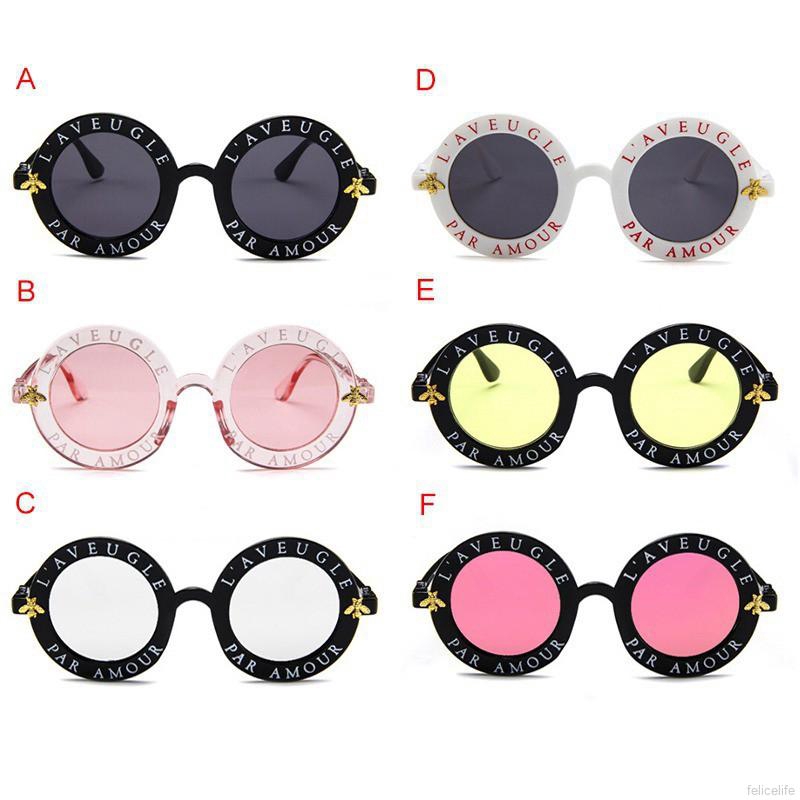 Kính mát gọng tròn khắc chữ độc lạ thời trang