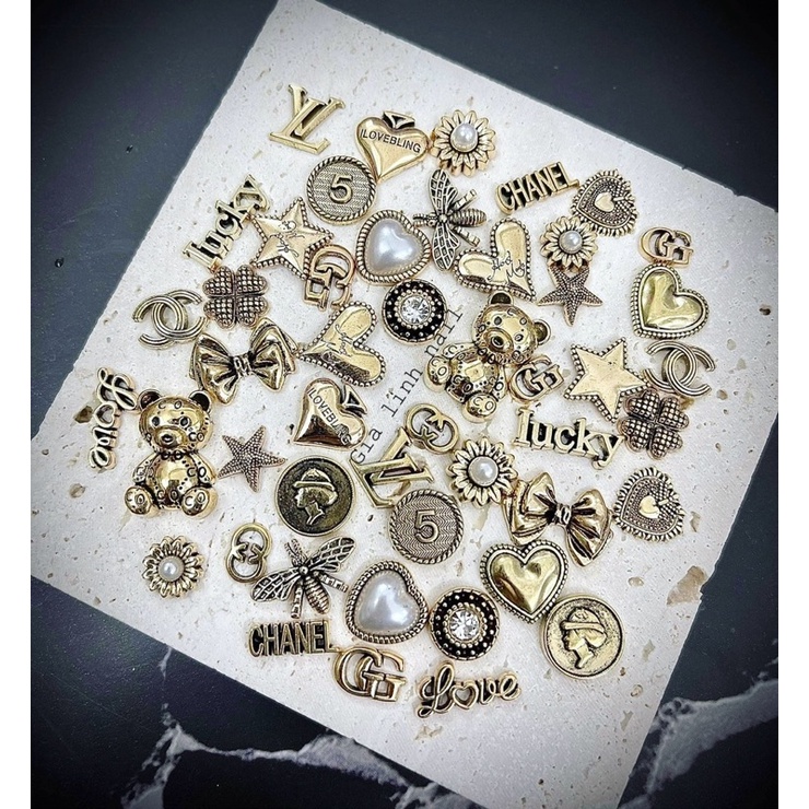 Charm set gấu nơ ( y hình )