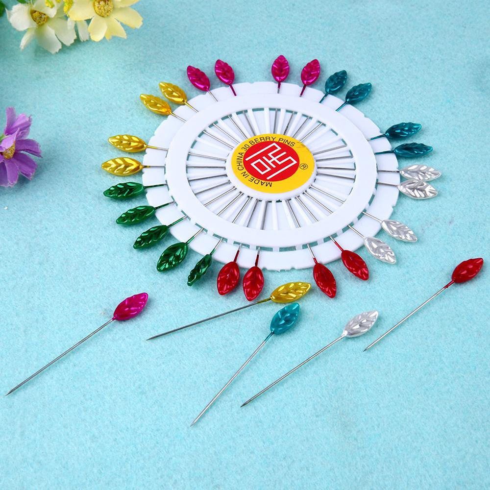 Kim may quần áo nhiều màu