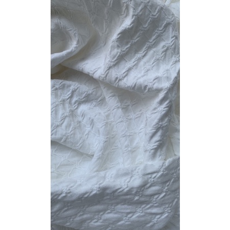 Vải thun thêu trắng