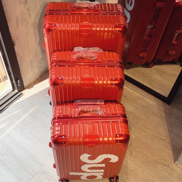 Va li khung nhôm khoá cài treo túi