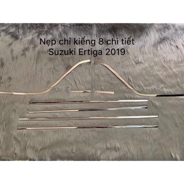 Chân kính ertiga 19