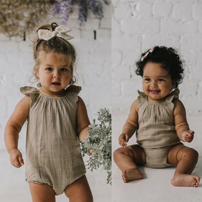 Jumpsuit Hở Lưng Tay Loe Màu Trơn Cho Bé Gái