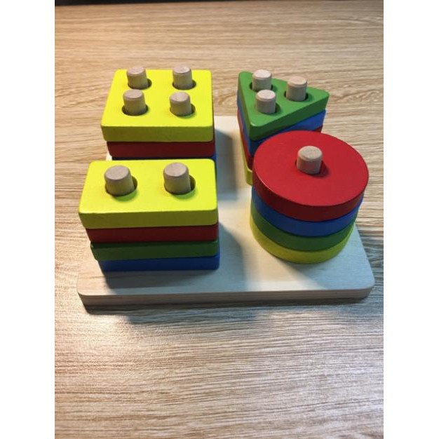 ĐỒ CHƠI GỖ MONTESSORI THẢ HÌNH 4 CỌC HÌNH KHỐI