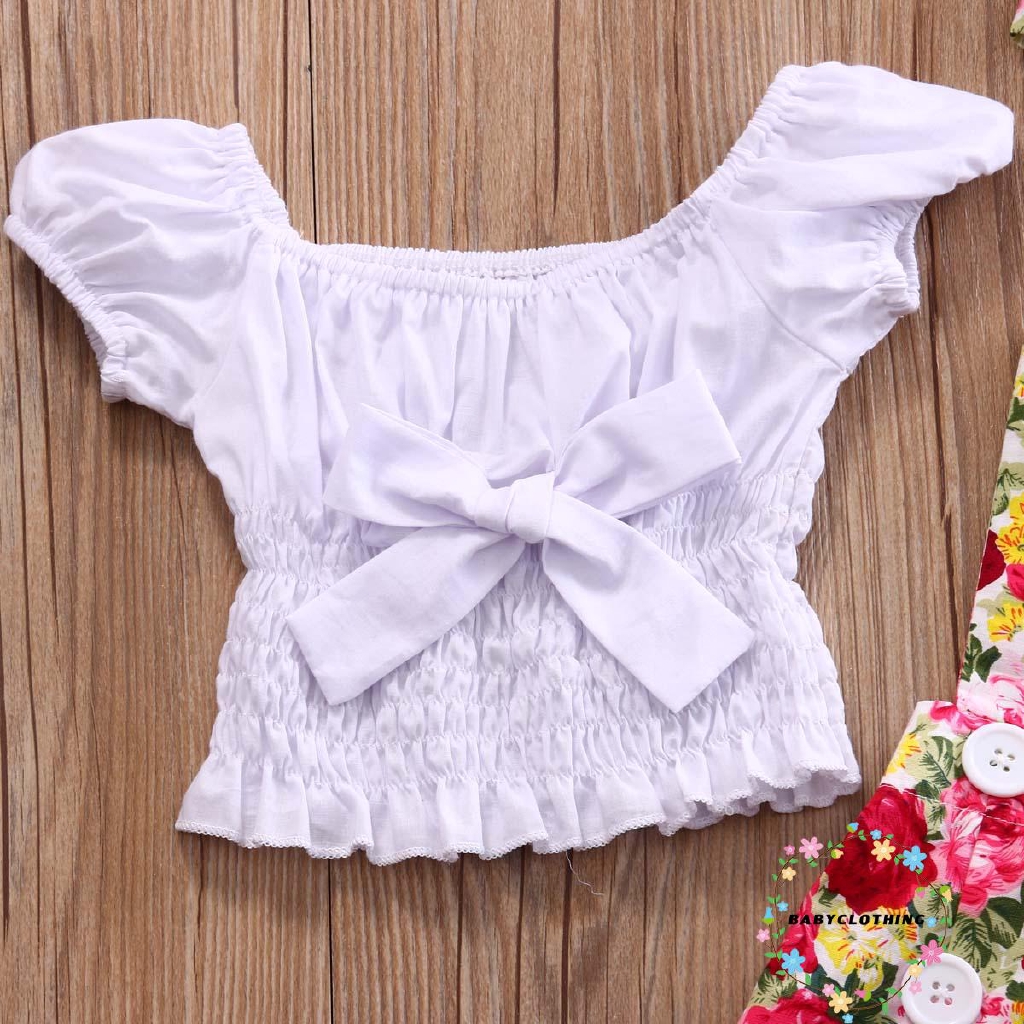 Bộ đồ gồm áo croptop/quần ngắn in hoa và băng đô xinh xắn dành cho bé gái