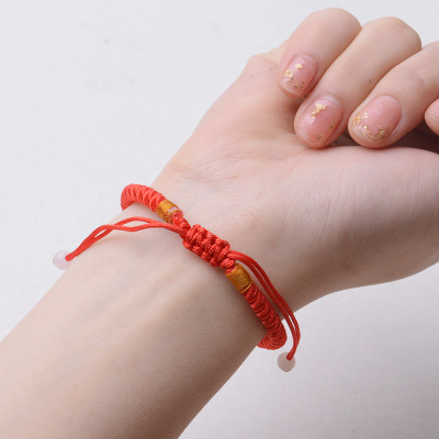 Vòng tay bện dây chỉ đỏ may mắn thiết kế đẹp cho cặp đôi