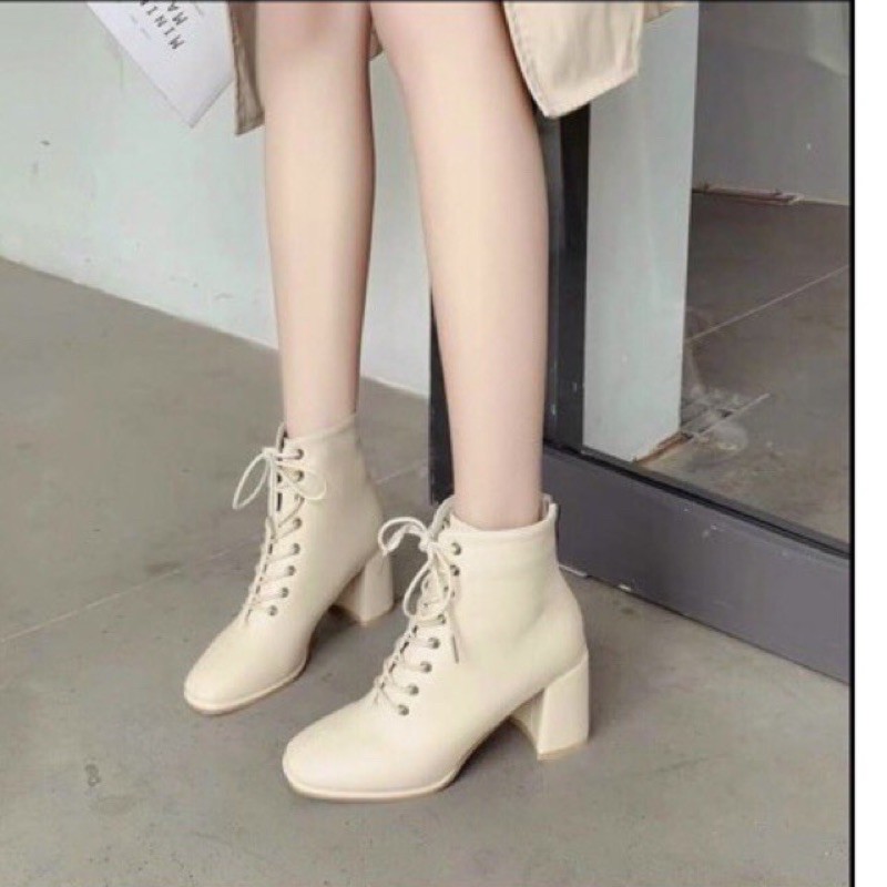 Bốt da nữ cổ cao dây Đan đế vuông cao 5 cm .